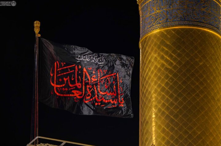 تقرير مصور/ استبدال راية قبّة مرقد أمير المؤمنين (عليه السلام) بمناسبة ذكرى استشهاد السيّدة الزهراء (عليها السلام)