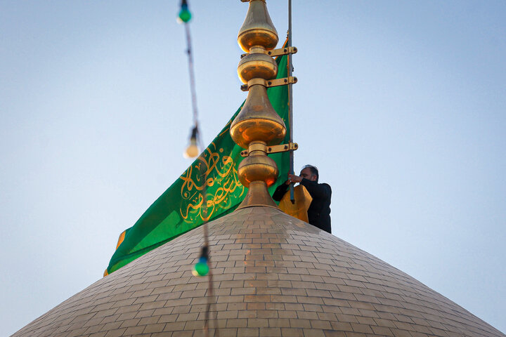 Photos: Flag-changing ceremony at Hazrat Masoumeh Holy Shrine