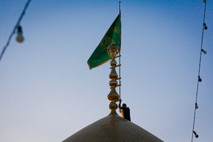 Photos: Flag-changing ceremony at Hazrat Masoumeh Holy Shrine