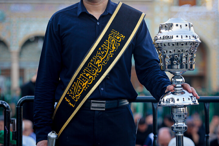 Photos: Flag-changing ceremony at Hazrat Masoumeh Holy Shrine