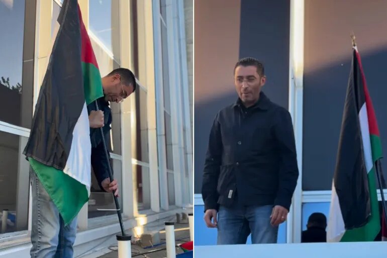 عمدة بلدية فينيسيو الفرنسية يرفع علم فلسطين على واجهة البلدية