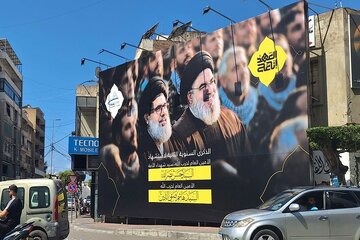 ضاحیه بیروت با تصاویر سید حسن نصرالله و سید هاشم صفی‌الدین مزین شد