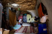 Photos: Palestinians take refuge in caves