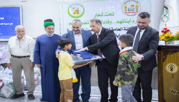 تقرير مصور/ العتبة الحسينية المقدسة تجهز عددا من أبناء الشهداء بالكسوة المدرسية في كربلاء