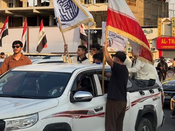 تقرير مصور/ العراقيون يحتفلون في بغداد بخروج القوات الامريكية من البلاد