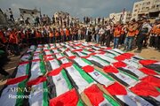 تقرير مصور/ تشييع 105 جثامين لفلسطينيين في مقبرة الشيخ "رضوان" في غزة
