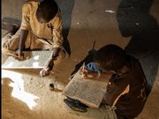 تراث مئات السنين في تعليم القرآن على الألواح الخشبية في نيجيريا  + صور