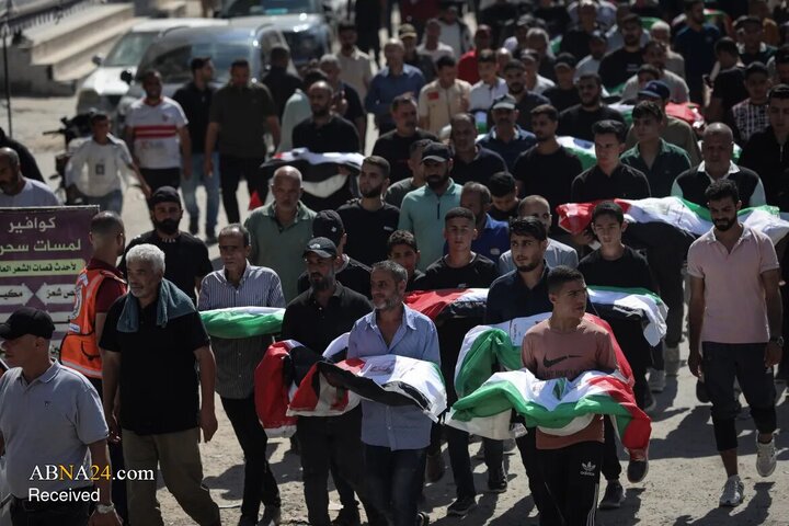 تقرير مصور/ تشييع 105 جثامين لفلسطينيين في مقبرة الشيخ "رضوان" في غزة