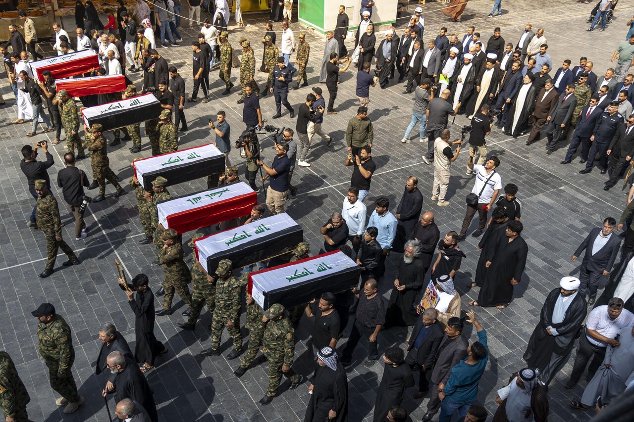 تقرير مصور/ مراسم تشييع الوجبة السادسة لرفات شهداء سجن بادوش في النجف الأشرف