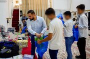العتبة العلوية توزّع الكسوة المدرسية على معاهد رعاية ذوي الإعاقة بالنجف الأشرف