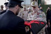 Photos: Presentation of flag of Imam Hussain Holy Shrine to Astan Quds Razavi