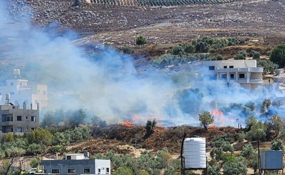 Extremist Israeli Settlers Attack Palestinian Olive Harvesters Across Nablus, Set Vehicle Ablaze