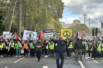 Thousands of pro-Palestine demonstrators march through central London
