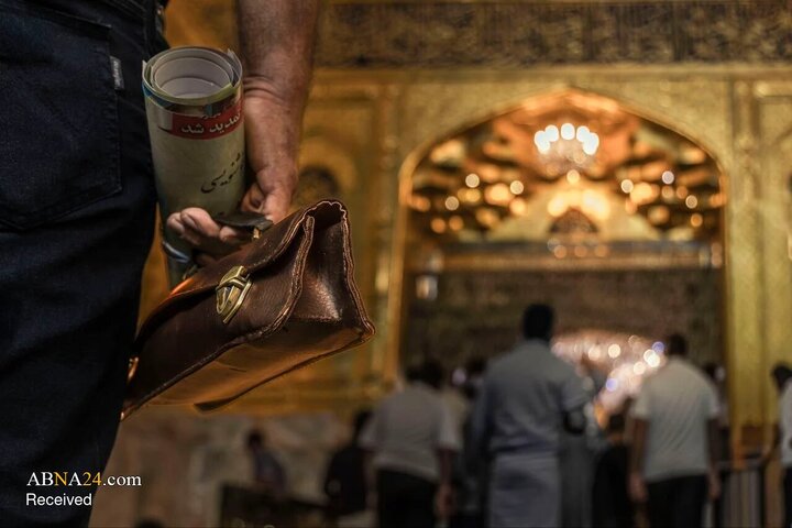 عکس خبری/ خوشنویسی هنرمند ایرانی در حرم حضرت عباس(ع)