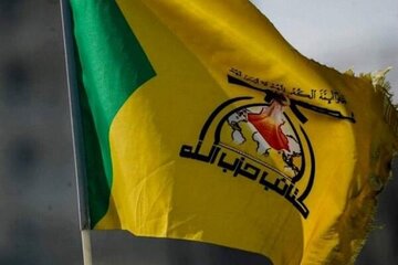 كتائب حزب الله يطالب بتعيين يوم في السنة لحرق العلم الأمريكي والصهيوني