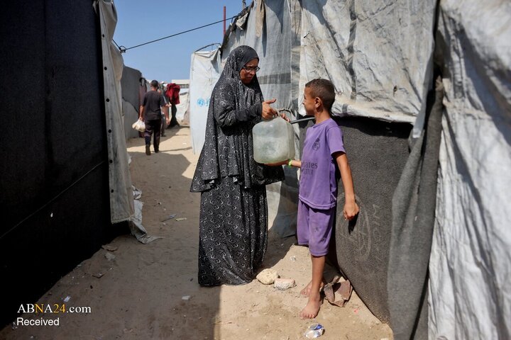 Photos: Palestinian Mother in Gaza Waits Six Hours for a Single Meal