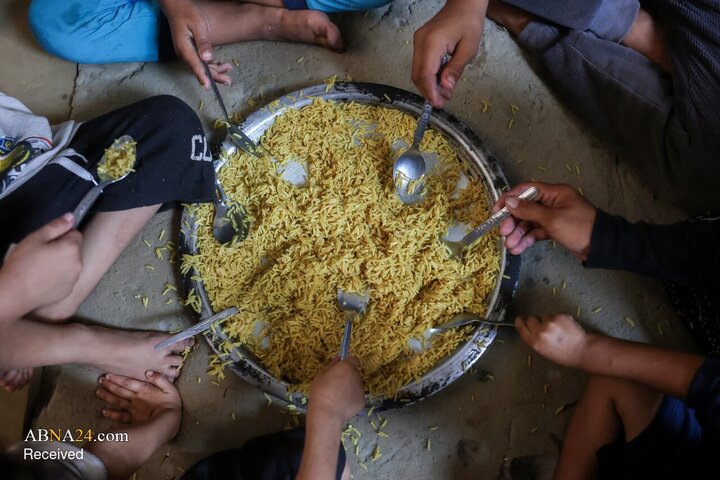 Photos: Palestinian Mother in Gaza Waits Six Hours for a Single Meal