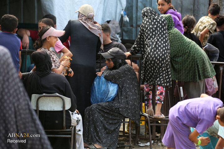 Photos: Palestinian Mother in Gaza Waits Six Hours for a Single Meal