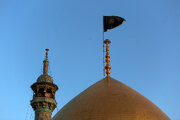 Photos: Raising of mourning flag for Martyrdom of Hazrat Zahra over Hazrat Masoumeh shrine