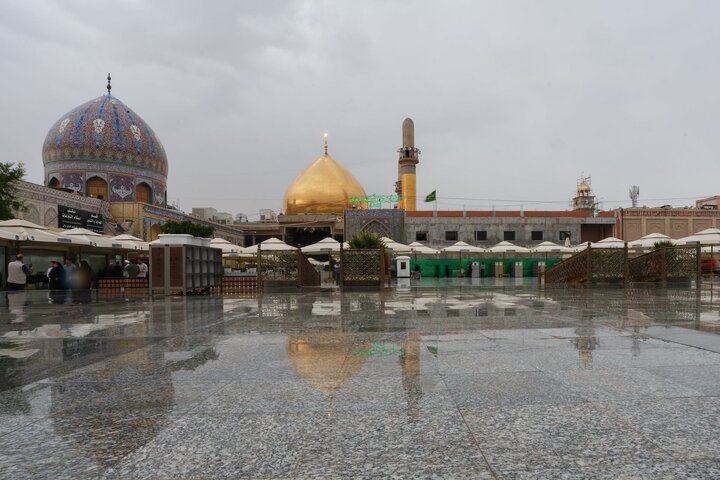 Rainfall brings a refreshing atmosphere to the Al-Askariyayn courtyard