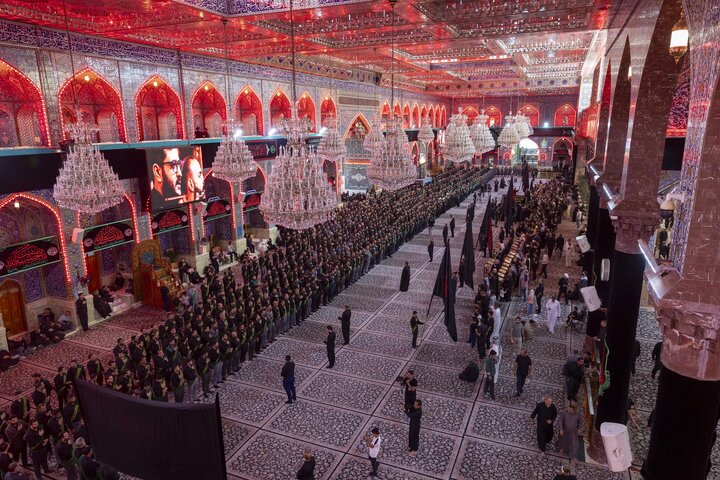 Through a unified funeral procession, staff of two holy shrines commemorate martyrdom of Lady Fatima az-Zahra
