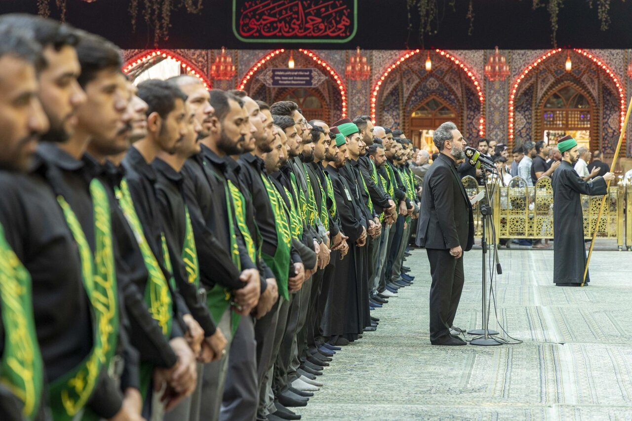 Servants of the Al-Abbas's (p) Holy Shrine perform the rituals of allegiance