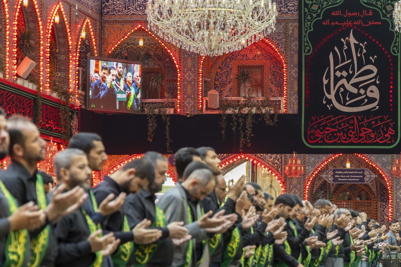 Servants of the Al-Abbas's (p) Holy Shrine perform the rituals of allegiance