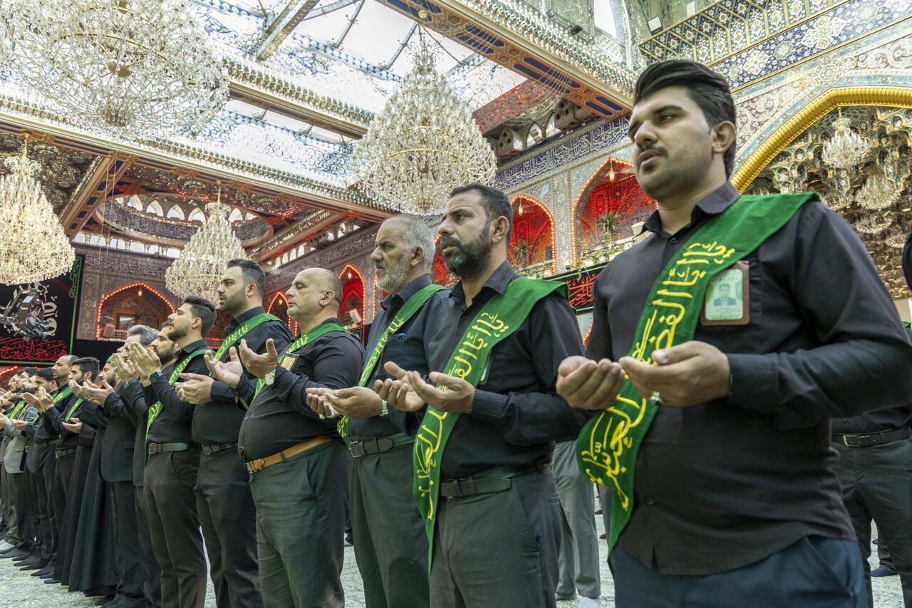Servants of the Al-Abbas's (p) Holy Shrine perform the rituals of allegiance