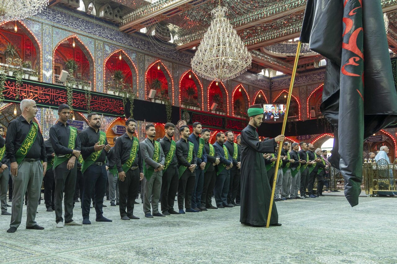 Servants of the Al-Abbas's (p) Holy Shrine perform the rituals of allegiance