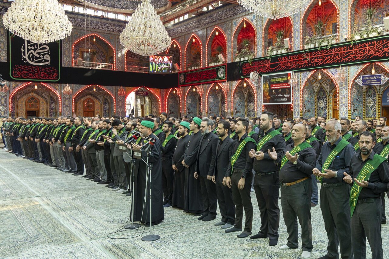 Servants of the Al-Abbas's (p) Holy Shrine perform the rituals of allegiance