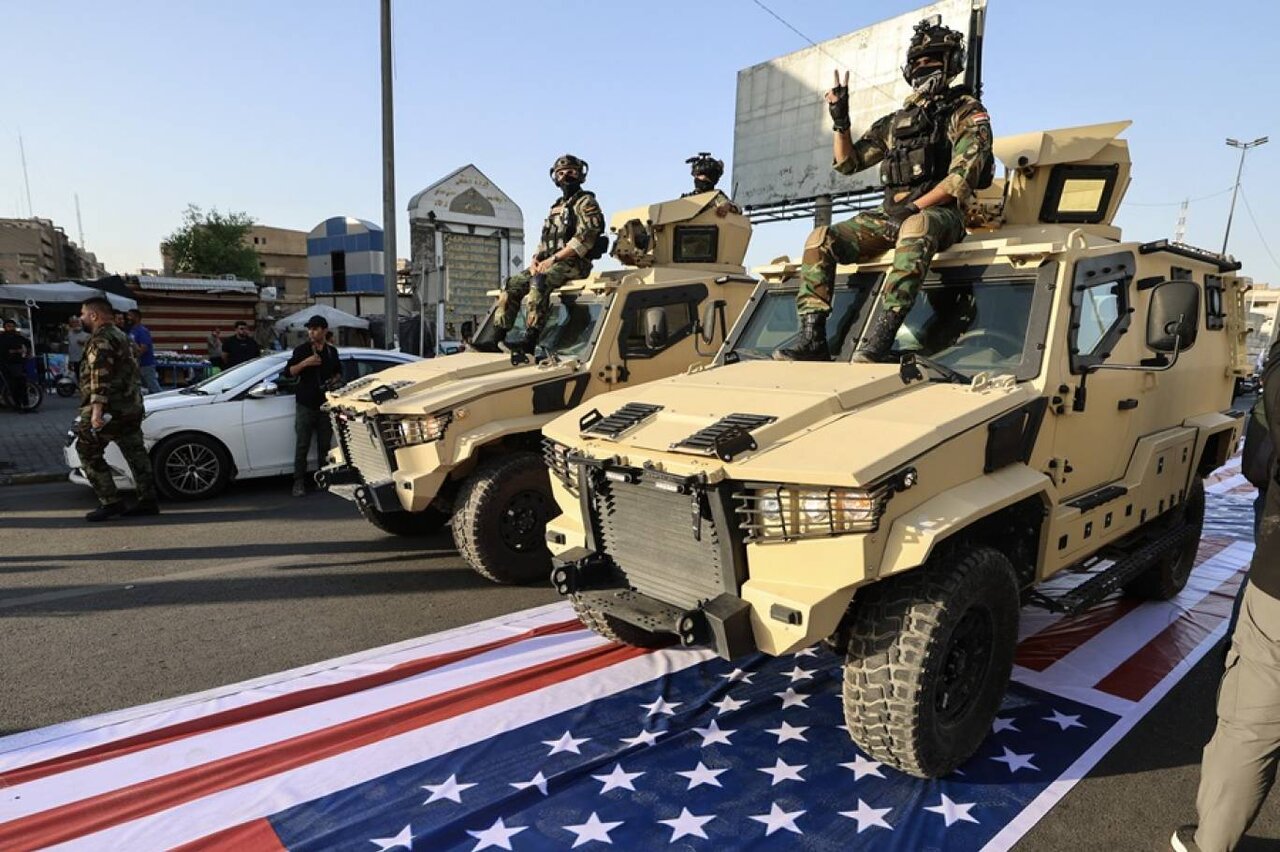 إقالة ضباط بسبب إهانة الحشد الشعبي للعلم الإمريكي في العراق