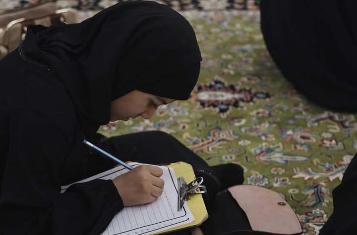 تقرير مصور/ 1500 متسابق يشارك في أداء الاختيبار التحريري لمسابقة حفظ دعاء العهد في النجف الأشرف