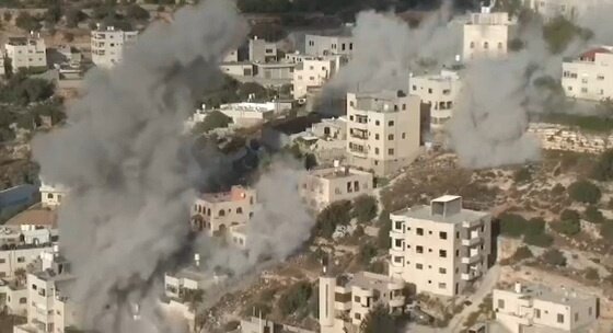 Israeli terrorist forces demolish homes of two martyred Palestinians in besieged al-Khalil