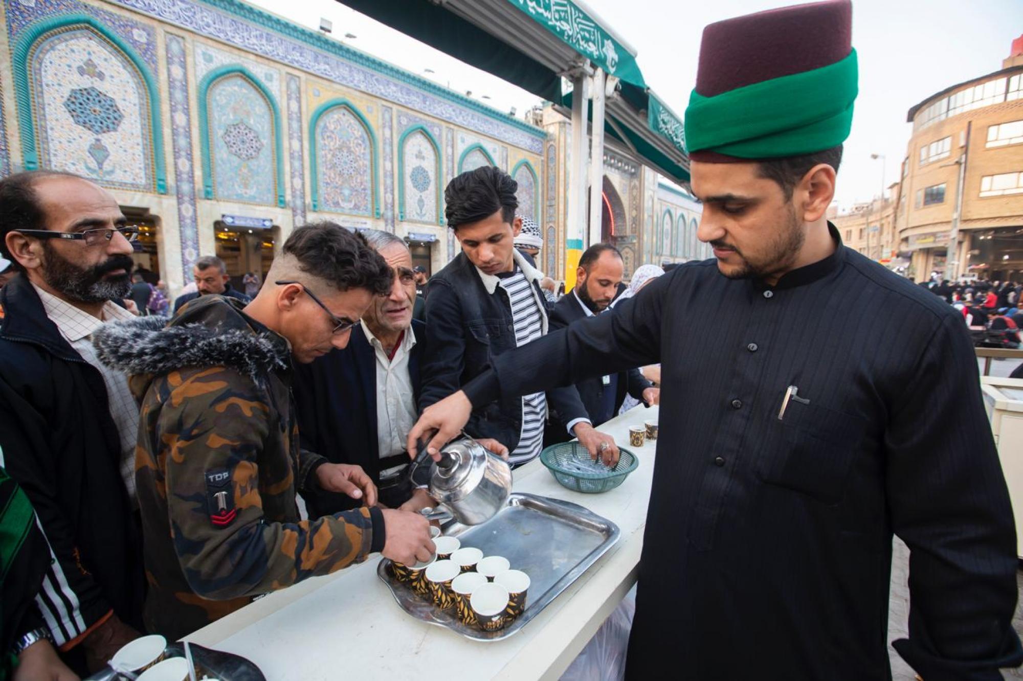 Sayed servants of al-Abbas shrine present to visitors on martyrdom Sayyida Zahra 