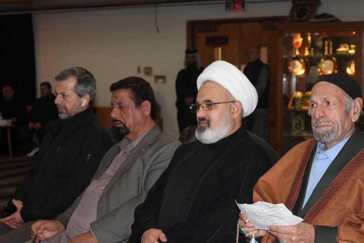 Flag of Aba al-Fadl al-Abbas holy shrine presented to a procession in Michigan of USA (+Photos)
