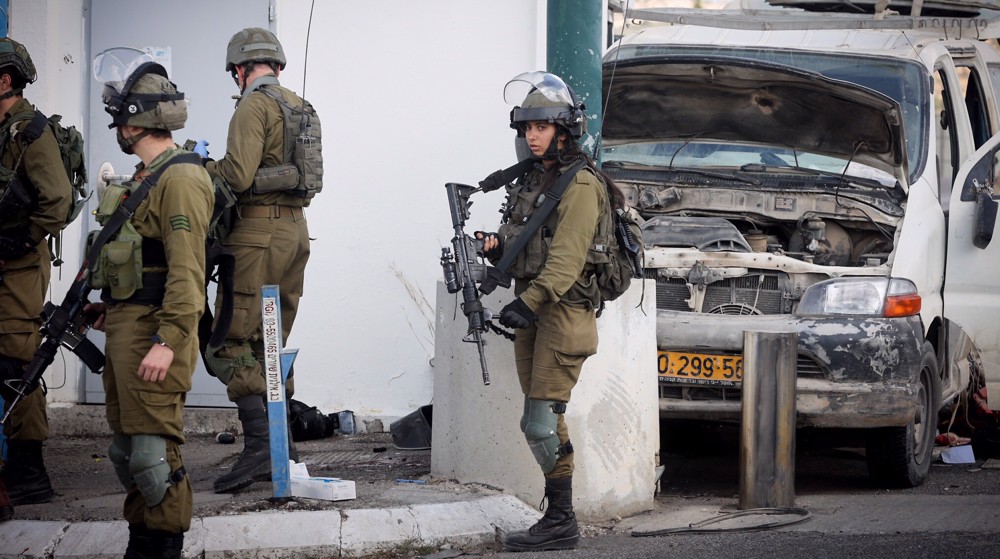  Palestinian driver shot martyred; Israeli terrorist soldier injured in car-ramming operation