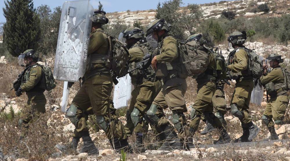  Israel terrorist forces put Palestinian camp, town under lockdown after shooting 