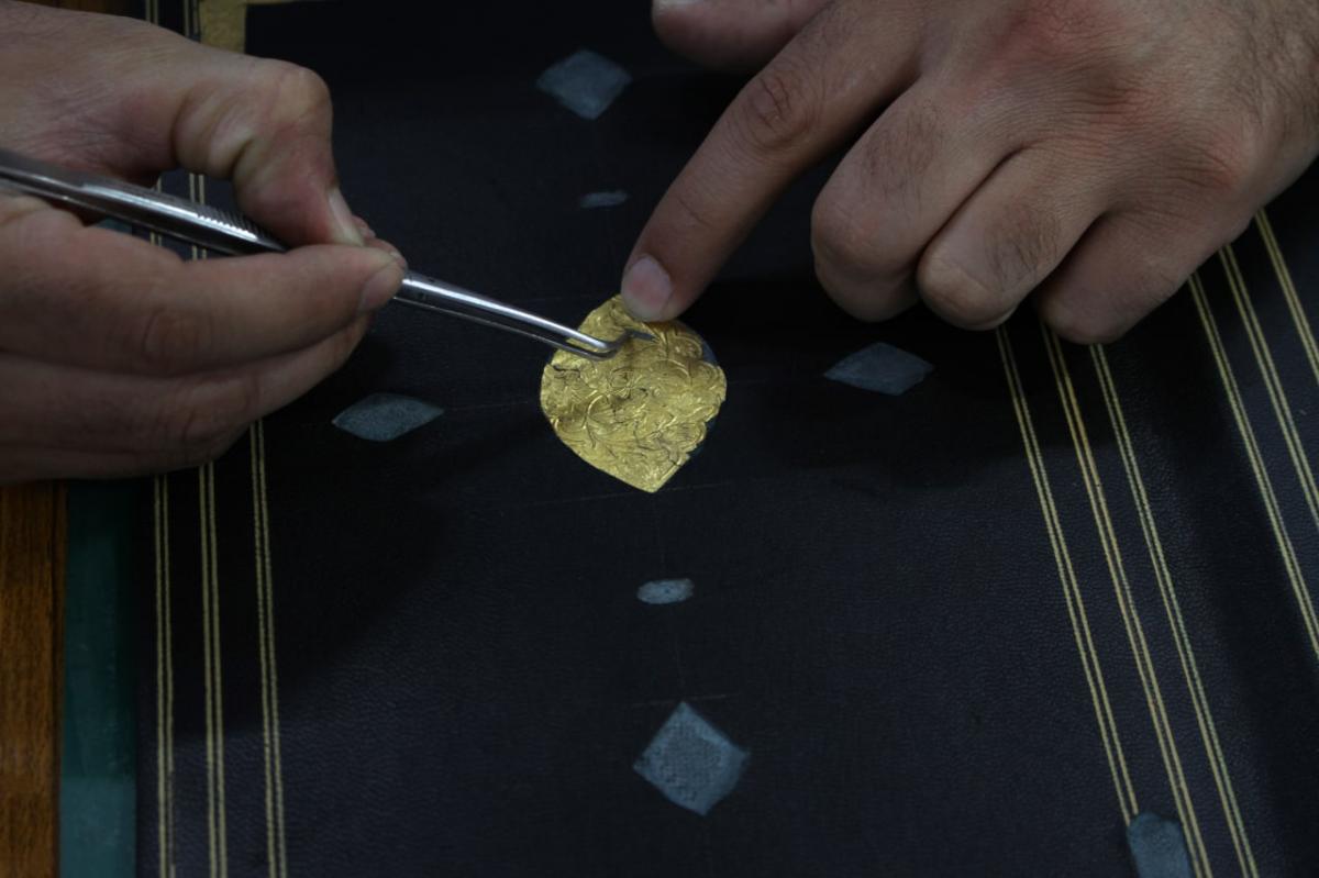 Al-Abbas holy shrine Cultural Affairs restoring a precious Quran (+Photos)