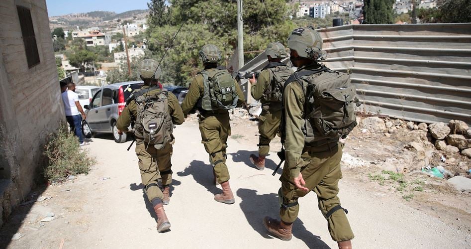 Zionist terrorist forces arrest 14 Palestinians in pre-dawn raids