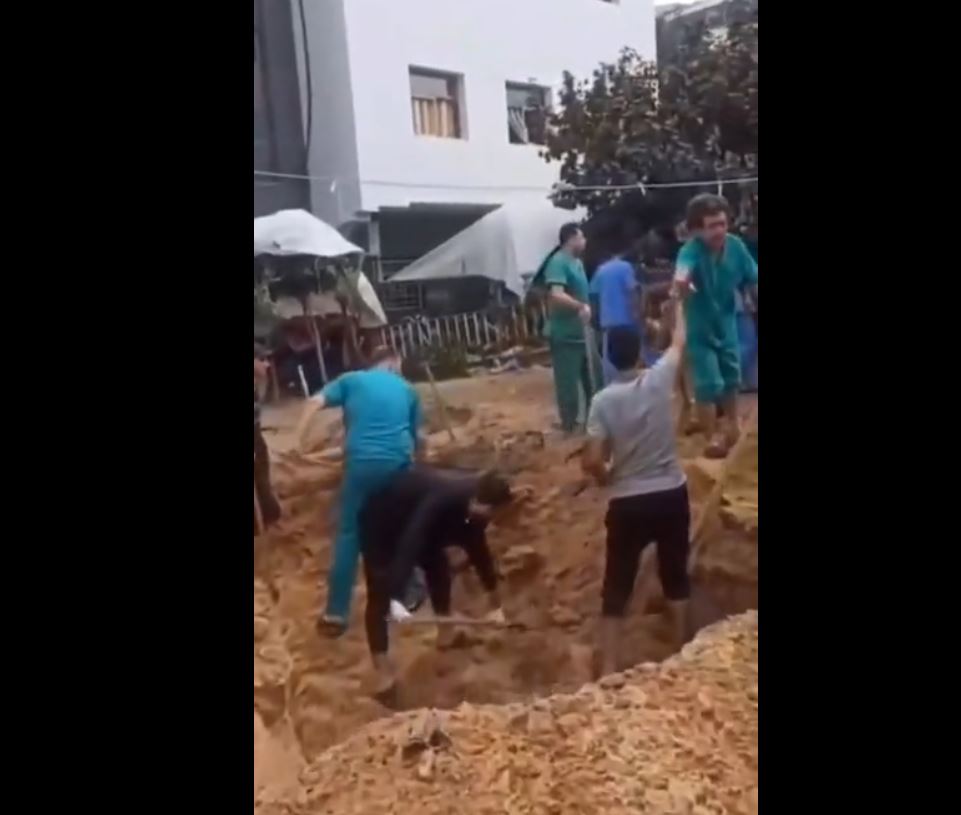 Video: Medical staff digging mass grave in Al Shifa hospital's garden to bury bodies 