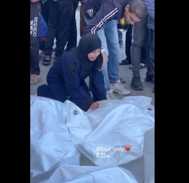 Video: Gaza residents taking a final farewell glance at their deceased loved ones before burial