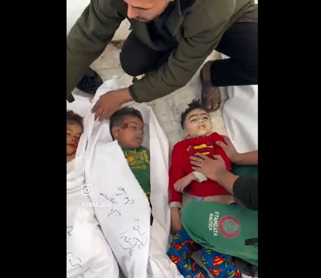 Video: A grieving father bids final farewell to his son murdered last night in Israeli bombardment 
