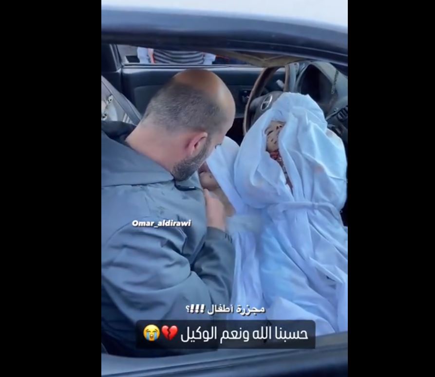Video: A Palestinian father sadly embraces his children killed by barbaric occupation regime