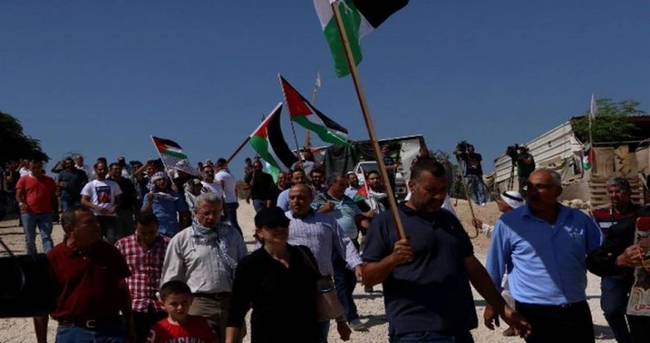 Palestinians perform Friday prayer in Khan al-Ahmar village
