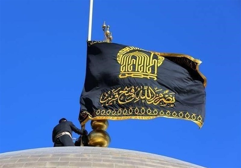 Video: Flag of Imam Hussain (a.s.) hoisted in Iran’s Mashhad