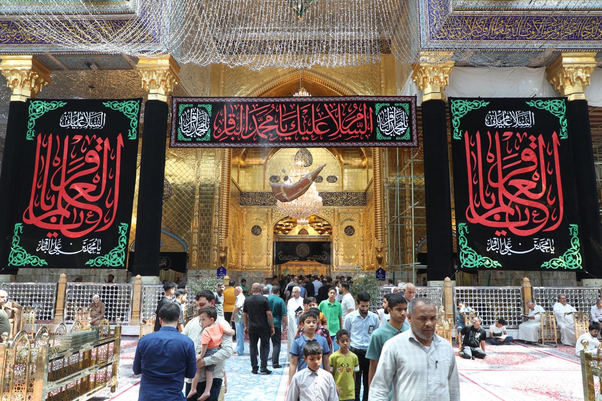 Al-Abbas Shrine covered with black to commemorate martyrdom of Imam al-Baqer 