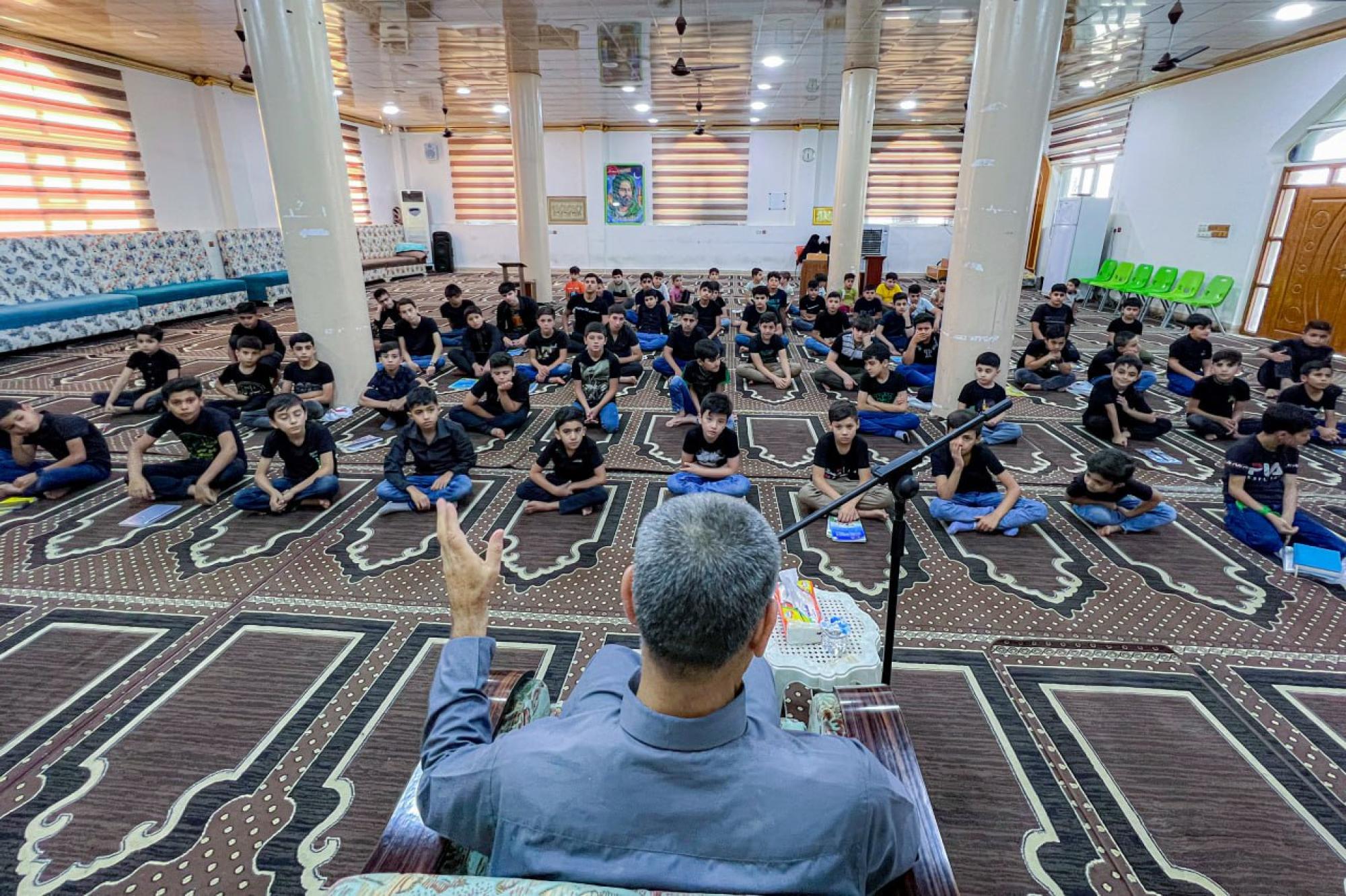 Mourning ceremony on Imam al-Baqir martyrdom for students of summer Quranic courses in Kirkuk (+Photos)