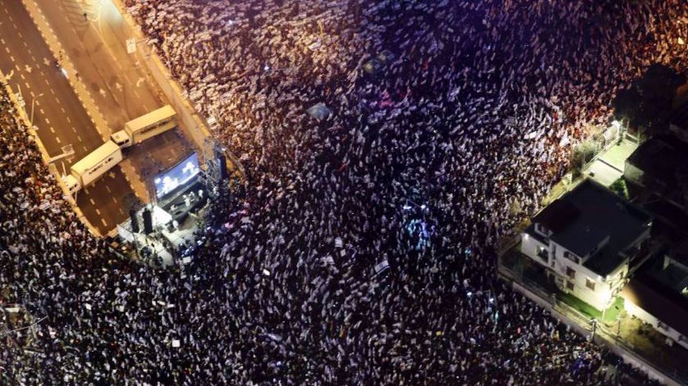 Israel's thousands-strong protests continue as Netanyahu fires minister