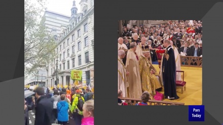 Король Карл III носит корону с украденными драгоценностями, а люди скандируют Not My King!