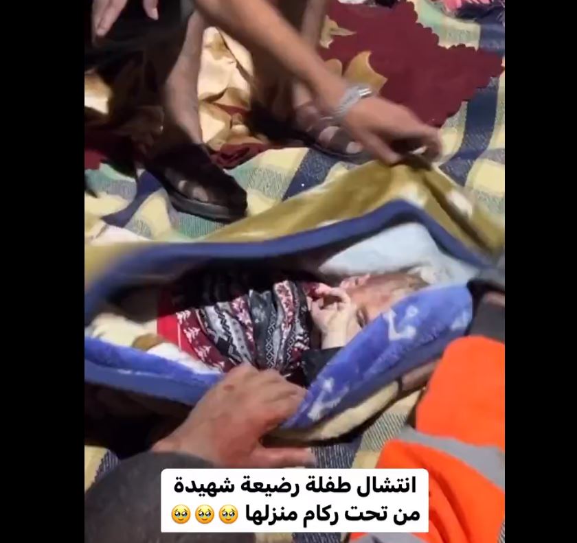 Video: A baby pulled out dead from rubble of a house bombed by Israeli warplanes in Gaza